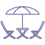 An illustrated icon of picnic area made up of two chairs and table and an umbrella. This is used to showcase the three courtyards at Worlds End Studios.
